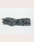 Black Sabah patterned headband on a white background